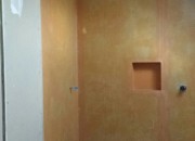 Bathroom stripped out and waterproofed ready for tiling